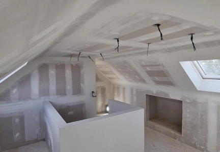 Transformation de charpente préfabriquée en W - Volume aménagé